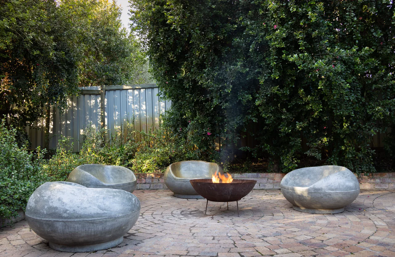 A designed backyard with planting and lighting